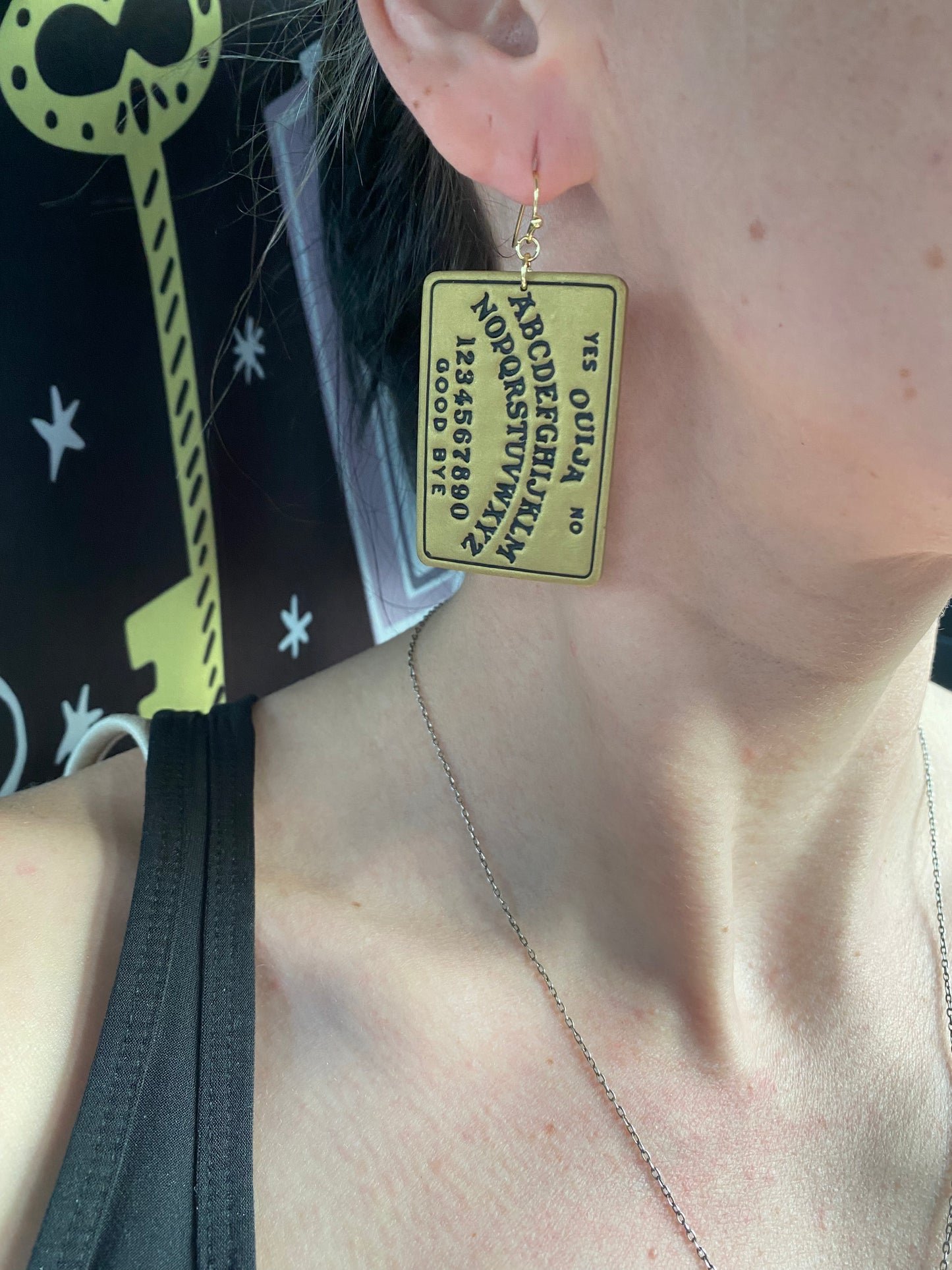 Gold spirit board earrings