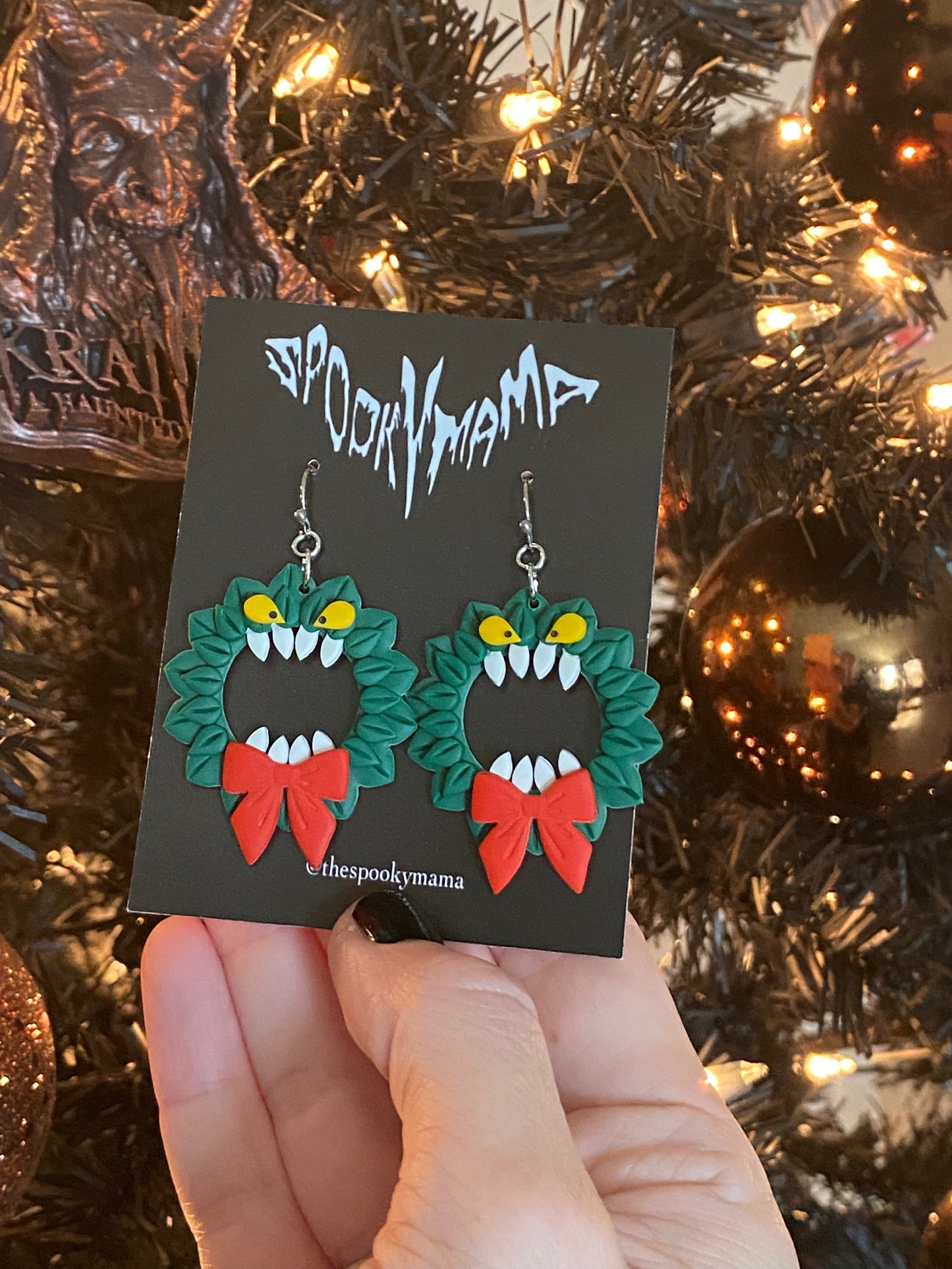 Man Eating Wreath Earrings