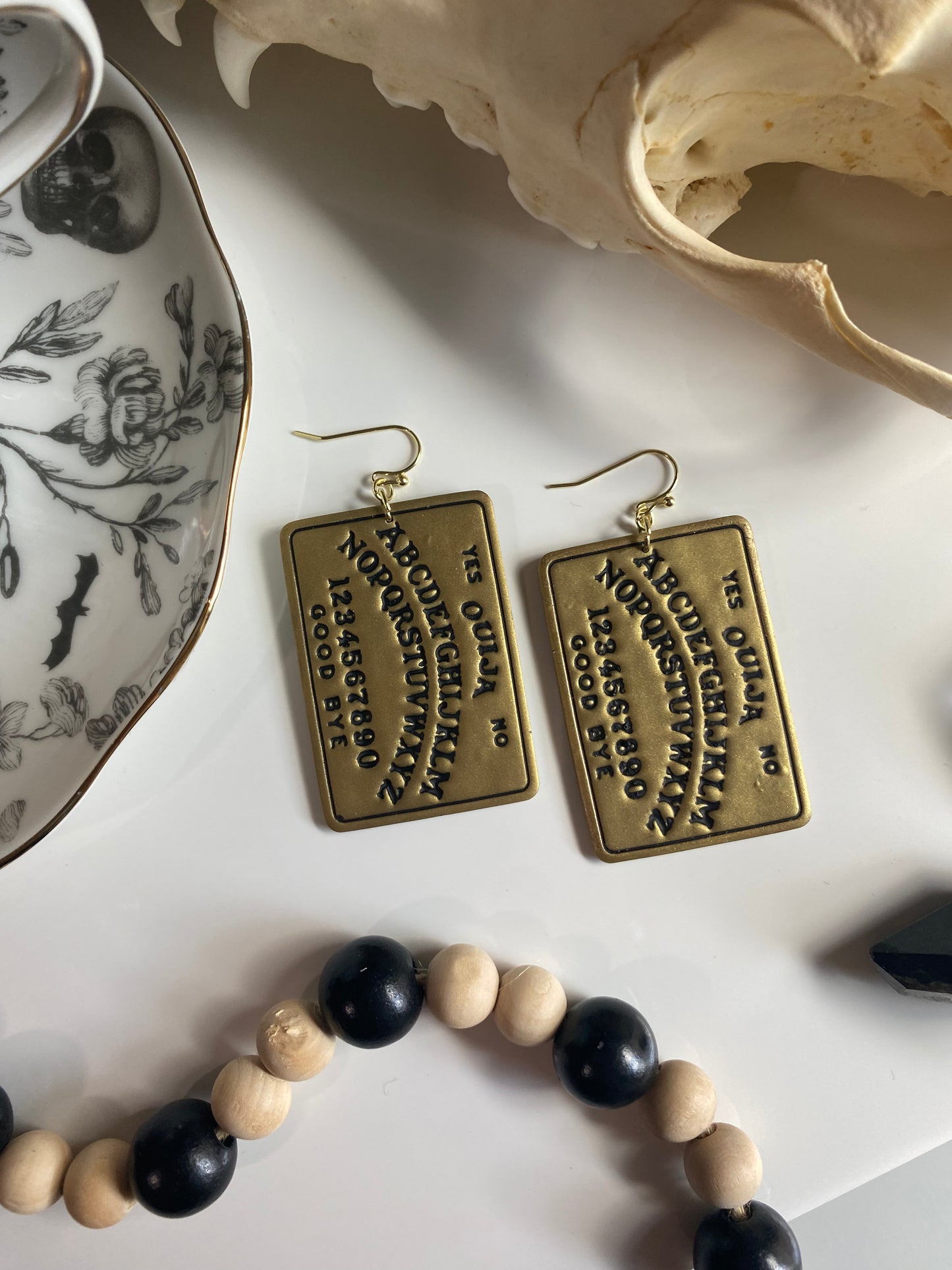 Gold spirit board earrings